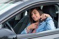 Pretty young brunette driving car Royalty Free Stock Photo