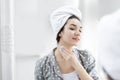 Pretty young brunette woman after shower wearing pajamas Royalty Free Stock Photo