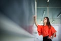 Pretty, young college student writing on the chalkboard Royalty Free Stock Photo