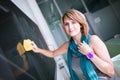 Pretty young college student writing on the chalkboard Royalty Free Stock Photo