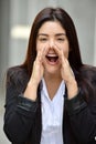 Diverse Business Woman Yelling Wearing Suit Royalty Free Stock Photo