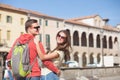 pretty young couple visiting Padua city , Italy