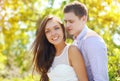 Pretty young couple in love outdoors in sunny summer Royalty Free Stock Photo