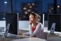 Pretty, young female college student using a desktop computer Royalty Free Stock Photo