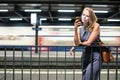 Female commuter waiting for her daily train