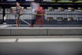 Pretty, young female commuter waiting for her daily train Royalty Free Stock Photo