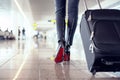 Pretty young female passenger at the airport