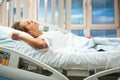 Pretty, young, female patient in a modern hospital room Royalty Free Stock Photo