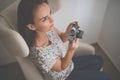 Pretty, young female photographer in her studio Royalty Free Stock Photo