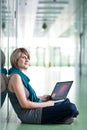 Pretty young female student on college/university campus Royalty Free Stock Photo