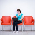 Pretty young female student with laptop Royalty Free Stock Photo