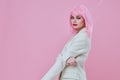 Pretty young female in White blazer pink hair Glamor Cosmetics color background unaltered Royalty Free Stock Photo