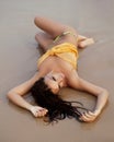 Pretty young girl on beach laying , getting tann Royalty Free Stock Photo