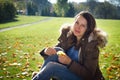 Pretty young girl enjoying beautiful nature during sunny day Royalty Free Stock Photo