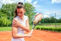 Pretty young girl injured during tennis practice Royalty Free Stock Photo