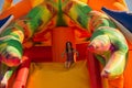 Pretty young girl joy in the water slides Royalty Free Stock Photo