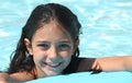 Pretty young girl in a swimming pool Royalty Free Stock Photo