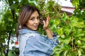 Pretty young girl in the vineyard, pretty young girl in the garden, young girl with grapes Royalty Free Stock Photo