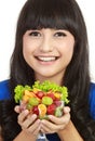 Pretty young lady holding fruit salad Royalty Free Stock Photo
