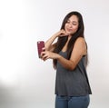 Pretty Young Lady Takes Picture On Her Phone Royalty Free Stock Photo