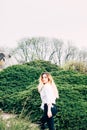 A pretty young long haired girl walking in a park Royalty Free Stock Photo