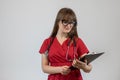 Pretty young nurse wear uniform holding stethoscope clipboard with documents isolated Royalty Free Stock Photo