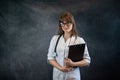 Pretty young nurse wear uniform holding stethoscope clipboard with documents isolated Royalty Free Stock Photo