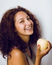 Pretty young real tenage girl eating apple close Royalty Free Stock Photo