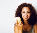 Pretty young real tenage girl eating apple close up smiling Royalty Free Stock Photo