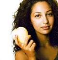Pretty young real tenage girl eating apple close up smiling