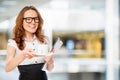 pretty young secretary with a cup of coffee Royalty Free Stock Photo