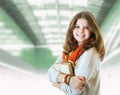 Pretty young student girl portrait with books