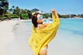 Pretty young tanned woman in bikini posing on the beach Royalty Free Stock Photo