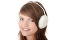 Pretty young teen girl wearing white earmuff Royalty Free Stock Photo