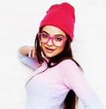 pretty young teenage girl hipster in pink glasses and hat emotio Royalty Free Stock Photo