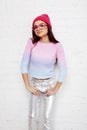 Pretty young teenage girl hipster in pink glasses and hat emotional posing happy smiling, lifestyle people concept Royalty Free Stock Photo