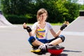 Pretty young teenager sitting meditating Royalty Free Stock Photo