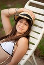 Pretty Young Woman in Bathing Suit and Hat Royalty Free Stock Photo