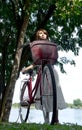 Pretty and young woman with bicycle Royalty Free Stock Photo