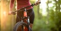 Pretty, young woman biking on a mountain bike Royalty Free Stock Photo