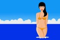 Pretty young woman in a bikini in the water on the beach Royalty Free Stock Photo