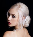 Pretty Young Woman with Blond Hair Up Royalty Free Stock Photo