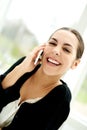 Pretty young woman chatting on her mobile Royalty Free Stock Photo