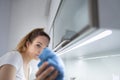 Pretty, young woman in her modern,  bright kitchen Royalty Free Stock Photo