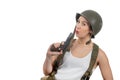 Pretty young woman dressed in ww2 american military uniform with helmet and handgun Royalty Free Stock Photo