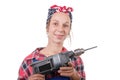 Pretty young woman with a drill on the white background