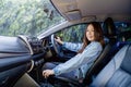 Pretty young woman driving car, roadtrip concept Royalty Free Stock Photo