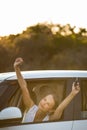 Pretty, young woman driving her car Royalty Free Stock Photo