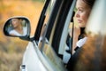 Pretty, young woman driving her car Royalty Free Stock Photo