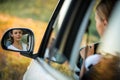 Pretty, young woman driving her car Royalty Free Stock Photo